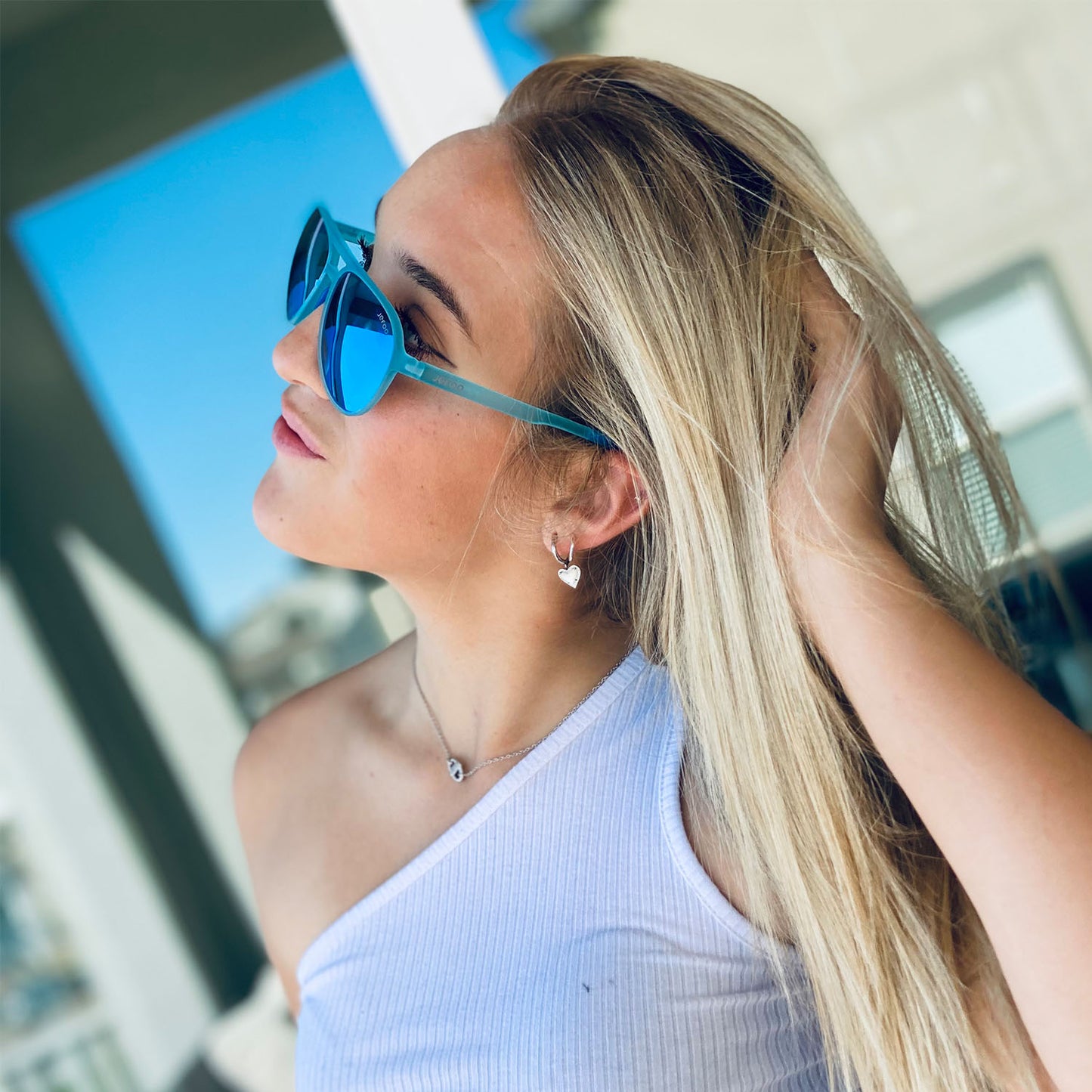 Beautiful woman with Sky Blue Chic Aviator Sunglasses